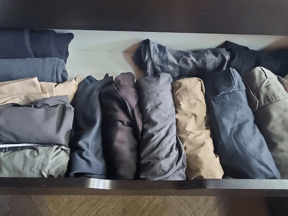 Easily organize and access your shorts with this rolled clothing technique.