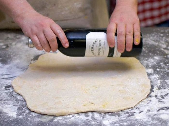 Use a wine bottle to roll dough if you don't have a rolling pin