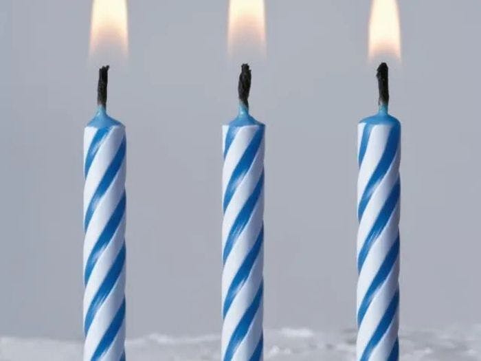 Use trick candles to help start a campfire.