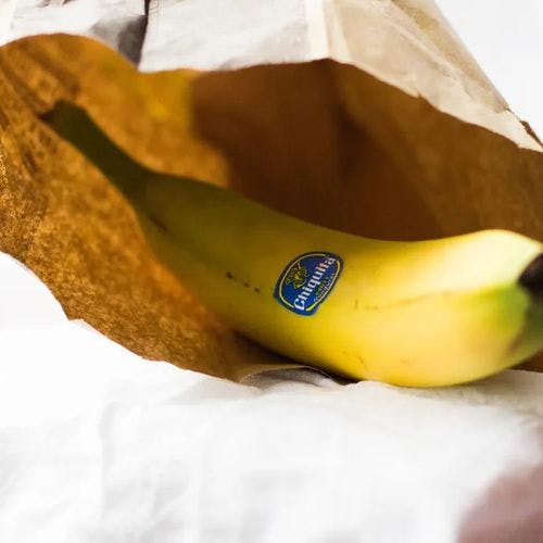 Place bananas in a brown paper bag to speed up the ripening process.