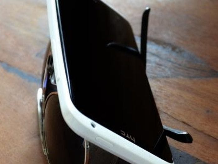 Create a phone stand out of your glasses or sunglasses.