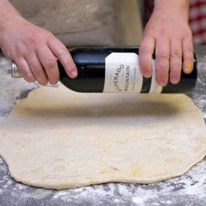 Use a wine bottle to roll dough if you don't have a rolling pin