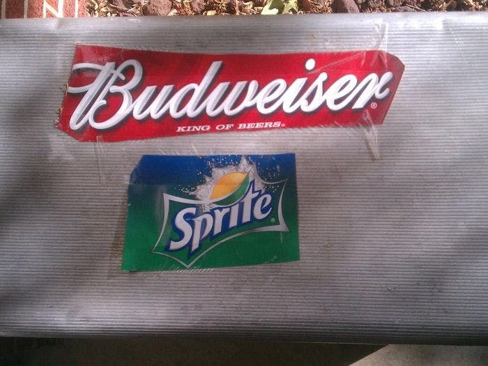 Tape the logo from the boxes of drinks that you stock your cooler with so your event guests know what's inside
