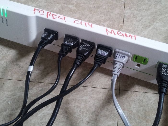 Label your electrical cords so you don't have to trace them back every time you're fiddling with the power strip.