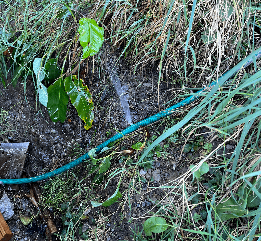 A garden hose with punctured holes can create a makeshift sprinkler.